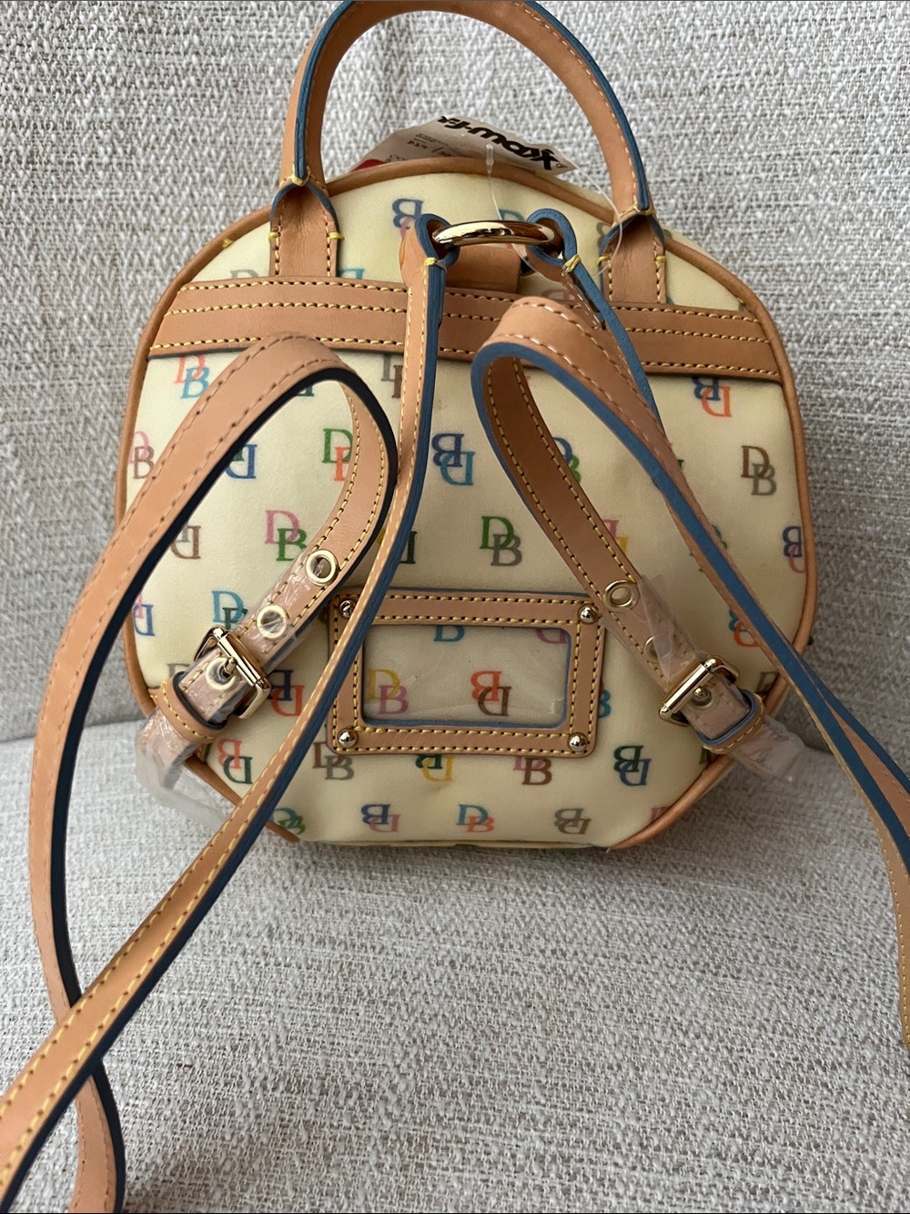 NWT Dooney & Bourke Cream Multicolor Logo Coated Canvas Backpack with Tan Trim - Picture 2 of 14